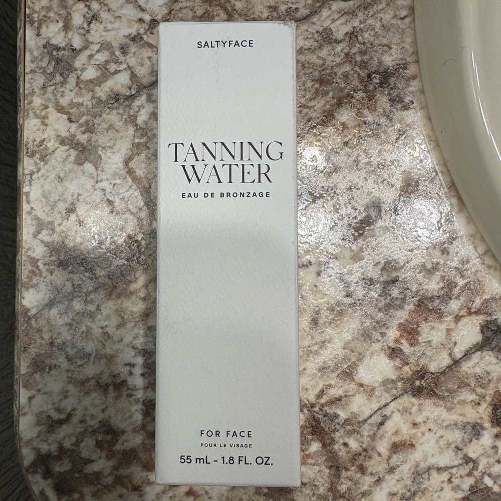 Salty Face Tanning Water Face light to medium